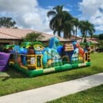 a inflatable bounce house in front of a house
